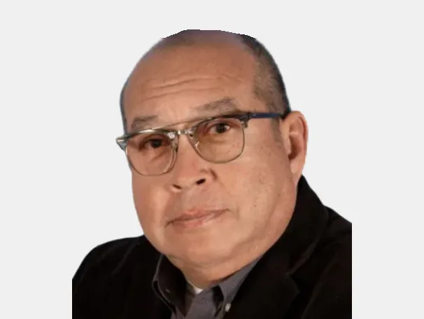 a man wearing glasses and a black jacket
